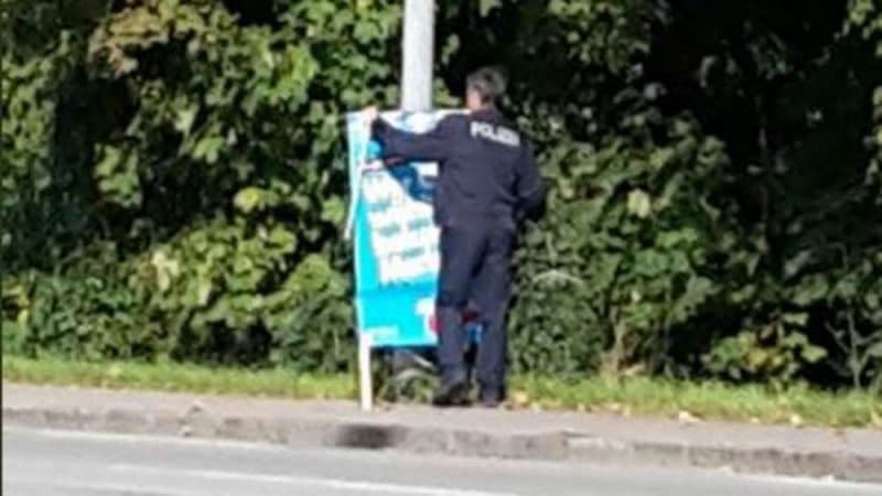 Новости: Скандал: полицейский развешивал плакаты АдГ