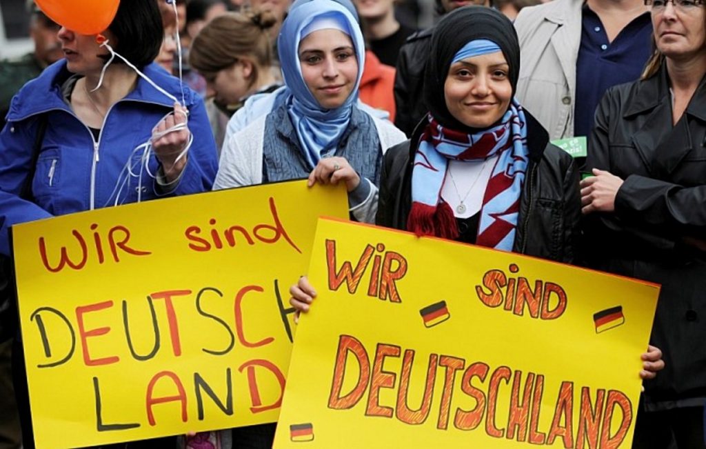 Политика: Германия заканчивает прием беженцев