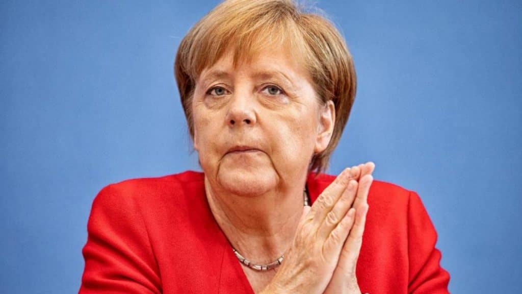 Политика: Меркель признала, что правительство виновно в изменении климата