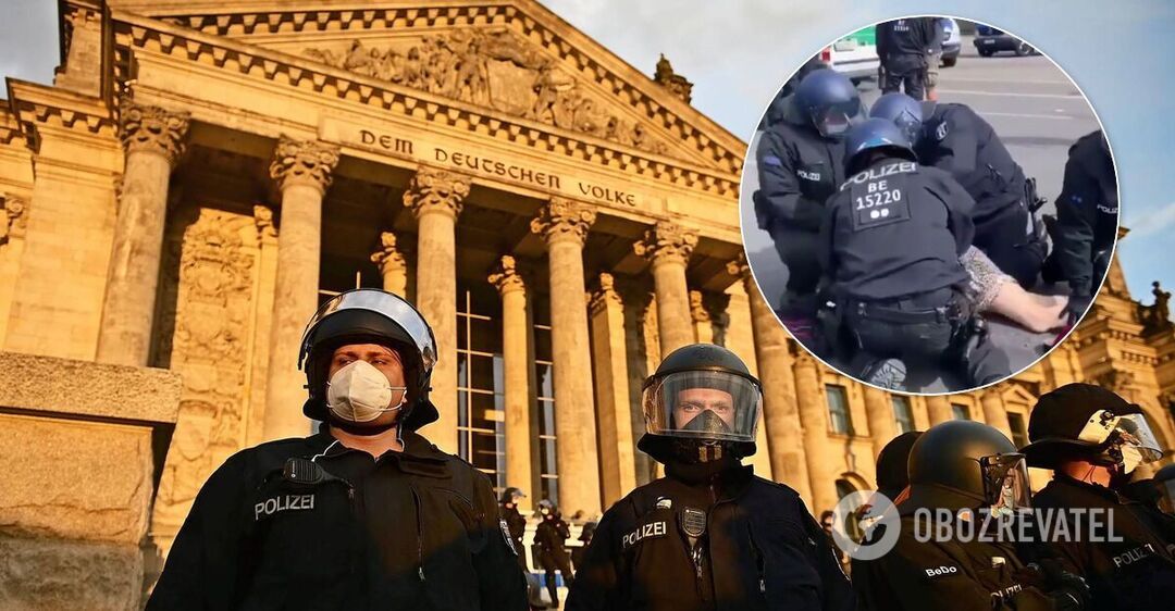В Берлине полицейский избил протестующую против карантина - видео