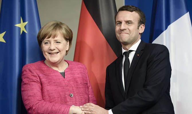 Мировая пресса: Меркель и Макрон договорились принять 400 несовершеннолетних мигрантов из лагеря на Лесбосе